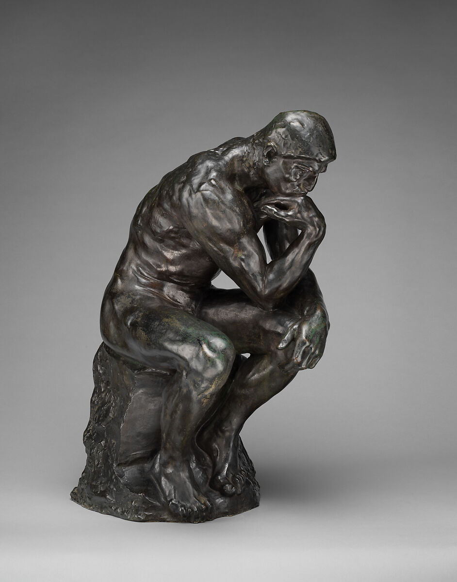 Photograph of the Met’s bronze cast of Rodin’s The Thinker, with his chin resting on his right hand.